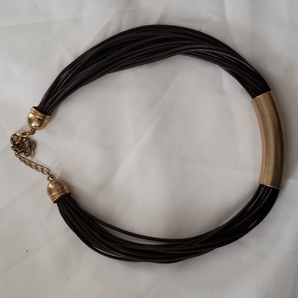 Leather and gold tone necklace